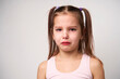 © Gecko Studio - Crying child girl against white background