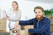© auremar - young family pregnant moving to a new apartment