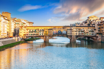 Wall Mural - Ponte Vecchio over the Arno river at sunset, in Florence, Tuscany in Italy