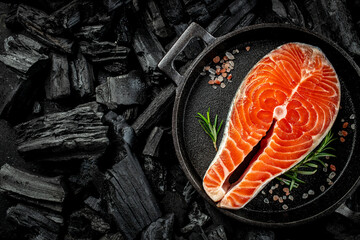 Canvas Print - salmon steak on BBQ grill coal. superfood concept. Healthy, clean eating. place for text, top view