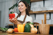 © NINENII - Woman preparing healthy food in her kitchen.