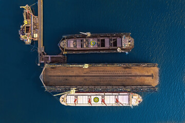 Wall Mural - Aerial top view container oil ship in shipyard for repair and maintenance.