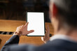 © JustLife - Close up of man using digital tablet