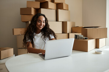 Wall Mural - Amazed extremely happy woman looking inside a box of groceries, shopping online, holding a package. rejoices in the parcel