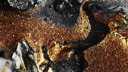 Wall Mural - Sparkling fluid. Paint mix. Liquid spill. Defocused shiny gold bronze silver gray color glitter wet ink motion abstract background.
