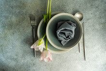 Close-up Overhead View Of A Spring Place Setting With Pink Tulips