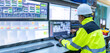 © reewungjunerr - Engineer working at control room,Manager control system,Technician man monitoring program from a lot of monitor
