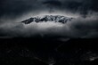 Black and white drone shot of Glendora Mountain in California covered with clouds