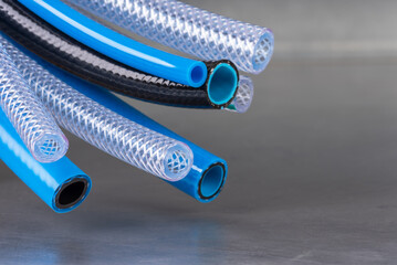 bunch of flexible water and air hose pipe