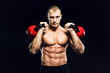 © Spanic - Muscular man with the kettlebells