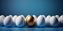 One Golden Egg Among White Eggs On Blue Background
