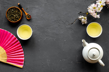 Wall Mural - Japanese table setting with teapot and cups of tea