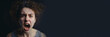 © AGSOL - Portrait of a screaming girl, banner with space to text. Studio portrait of a screaming girl, emotional facial expression of a woman screaming in anger. Gray background and copy space. Generative AI