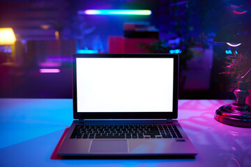 modern office with laptop blank screen