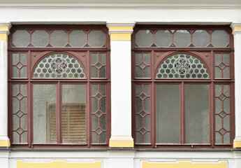 Wall Mural - view of city building with beautiful wooden windows