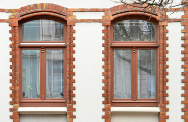 Wall Mural - view of brick building with wooden windows