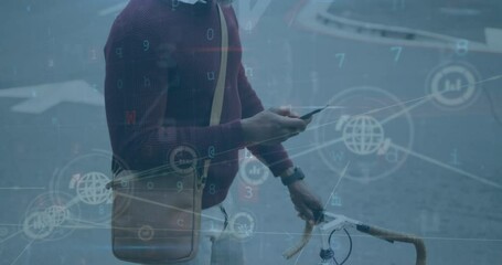 Canvas Print - Animation of connected icons over african american holding bicycle and using cellphone