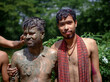 © Susmit - South asian young brothers smiling in wet body standing at outdoor