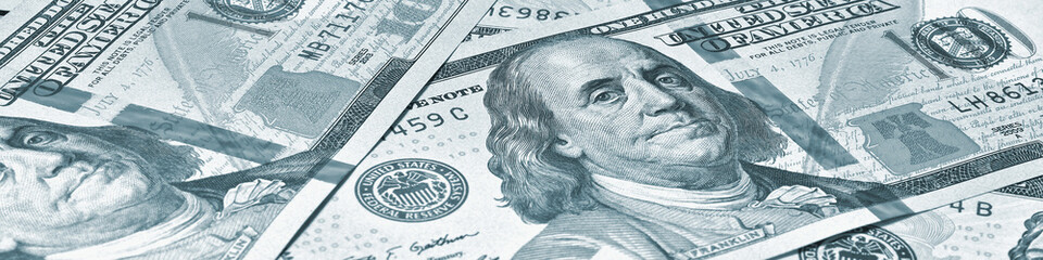 Wall Mural - american paper money. 100 dollar and other us bills. grey-green tinted banner or header. savings eco
