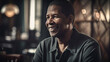 © LAYHONG - Portrait of happy african american man laughing while sitting in cafe, Generative AI