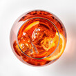 Aperol Spritz, glass seen from above, white background