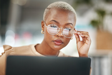 Canvas Print - Office, laptop and black woman, reflection in glasses and thinking, checking email or search on digital report. Computer, concentration and journalist reading article for African online news website.