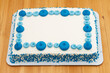 Blank white and blue birthday cake