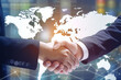 Smart logistics, Global business concept. Businessman making handshake for successful business, investment deal teamwork and partnership business partners on logistic global network and supply chain