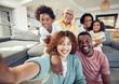 © Charlize D/peopleimages.com - Relax, smile and selfie with black family in living room for social media, bonding and proud. Happiness, picture and generations with parents and children at home for memory, support and weekend