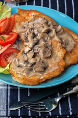 Poster - Crispy fried homemade potato pancakes with mushroom sauce.