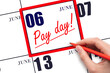 Hand writing text PAY DATE on calendar date June 6 and underline it. Payment due date