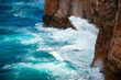 waves of the atlantic ocean crashing on rocks at portugal