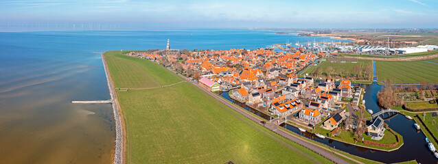 Wall Mural - Aerial panorama from the historical city Hindeloopen at the IJsselmeer in the Netherlands