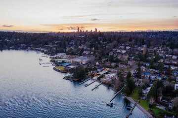 Cityscape of Seattle surrounded by the sea in the evening