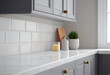 © YuliiaMazurkevych - Close up details of contemporary white apartment kitchen with subway tiles, AI Generated