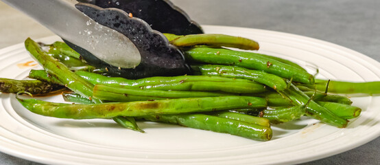 Pan fried French green beans (Haricots Verts) recipe. String beans close-up