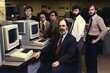 © Pajaros Volando - Retro vintage photography of teamwork of IT specialist back in the 80s. Generative AI