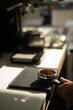 © pariwatpannium - Hand of Barista Holding a Coffee Tamper