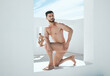 © Kay A/peopleimages.com - Man model, naked statue and art deco frame of a male posing outdoor for fine and lgbt artwork. Architecture, nude and live greek statues with a person with power and homosexual figure for creativity