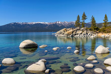 Rocky Blue Lake - A Calm Spring Day View Of A Crystal-clear Rocky Cove At Sand Harbor Of Lake Tahoe, California-Nevada, USA.