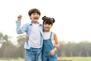 Poster - image of brother and sister having fun in the park