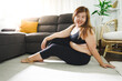 © Charlie's - Body confidence. Asian woman Overweight plus size woman wearing sportswear for exercising. self confident Body positive concept.