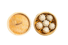 Steamed Baozi Dumplings Stuffed With Meat In A Bamboo Steamer.  Isolated, Transparent Background.