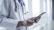 Close-up of doctor using a digital tablet. Based on Generative AI