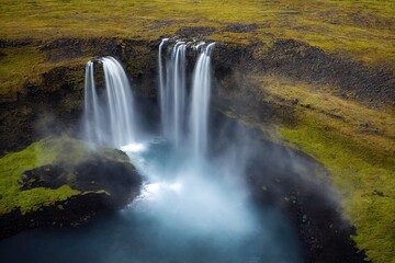 Poster - Brown green hills and steep waterfalls on Iceland aerial river, created with generative ai