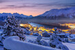 © robertharding - Fairy tale view of Saint Moritz on a snowy winter dusk, Engadine, Graubunden canton, Switzerland