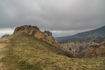 Wall Mural - Landscape of Karadag Reserve in spring. View of rocks of ridge Karagach. Crimea