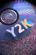 Y2K Letters on Music CD with Glittery Background