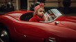 © NAITZTOYA - a little girl drives a red sports car, her hair is flying in the air, generative ai illustration