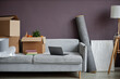 © Seventyfour - Horizontal image of furniture and things in cardboard containers preparing for relocation